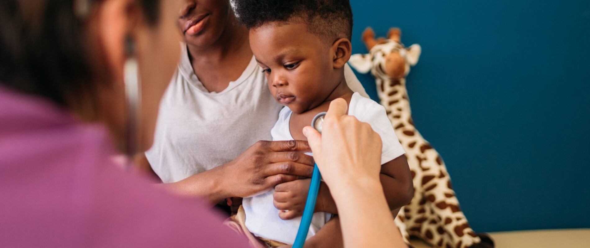 Little boy having a checkup with doctor